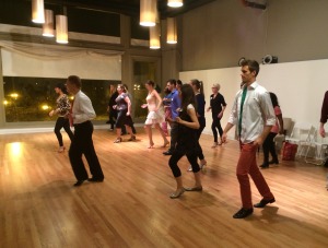 Image of people dancing in a group class